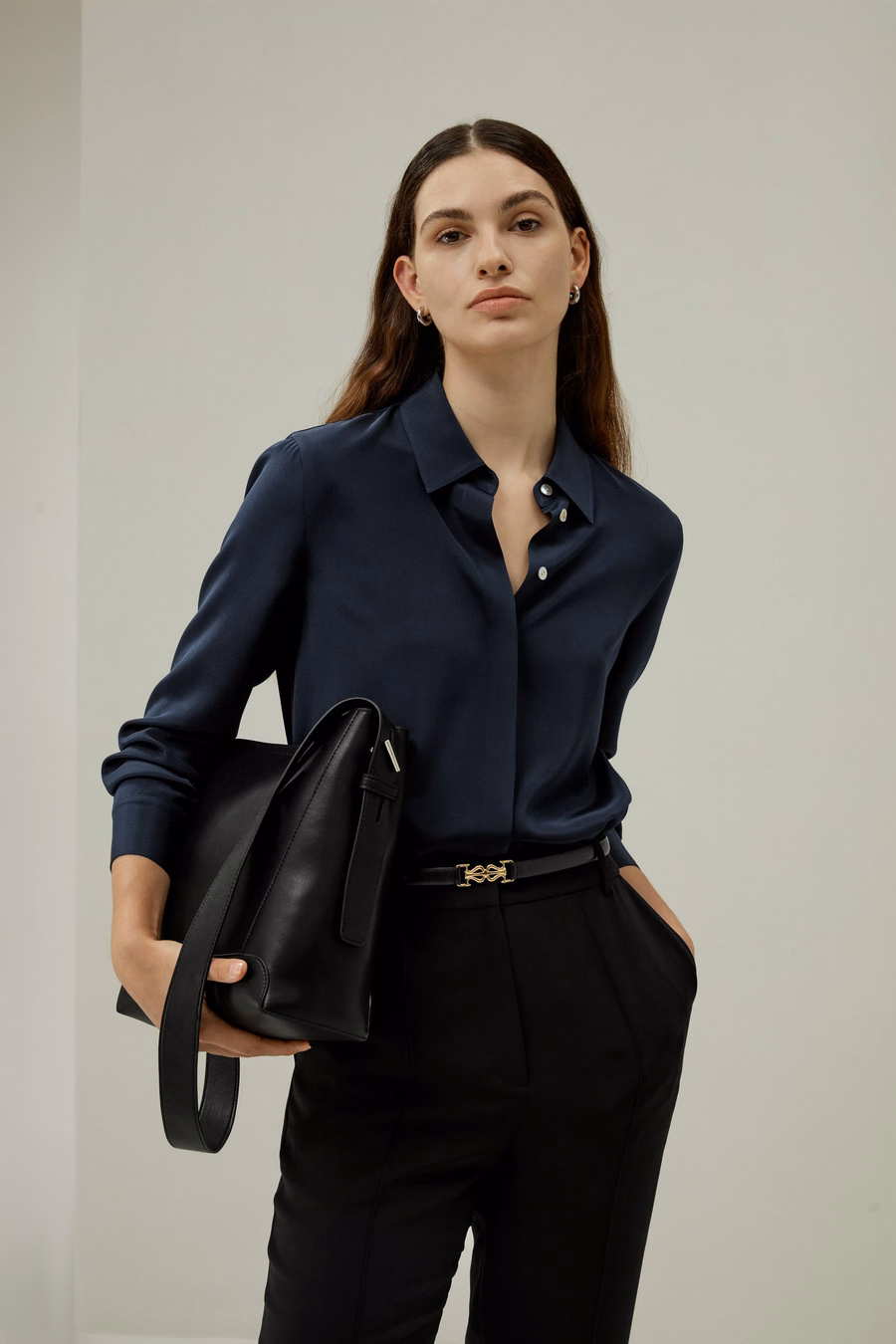 Blusa de seda elegante con botones