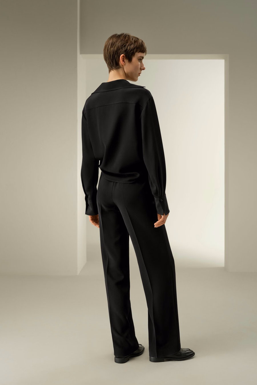 Blusa de seda elástica de lujo