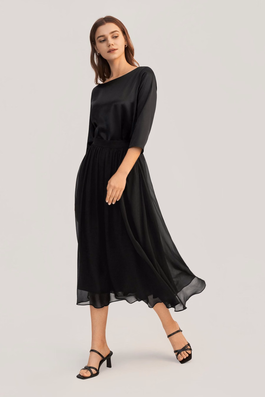 Blusa de seda con cuello barco de 3/4 de manga