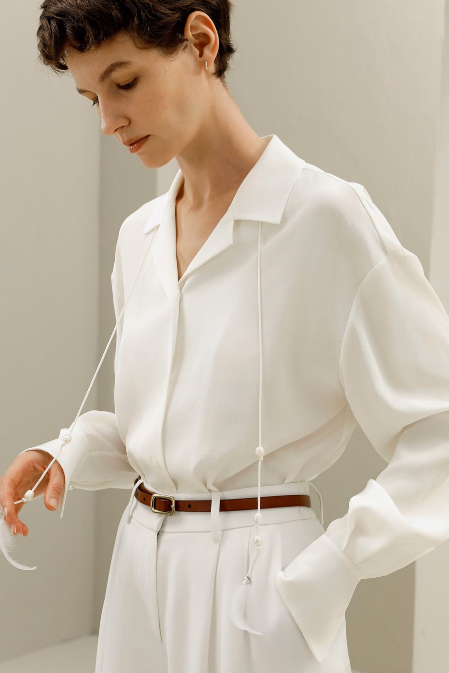 Blusa de seda con lazo